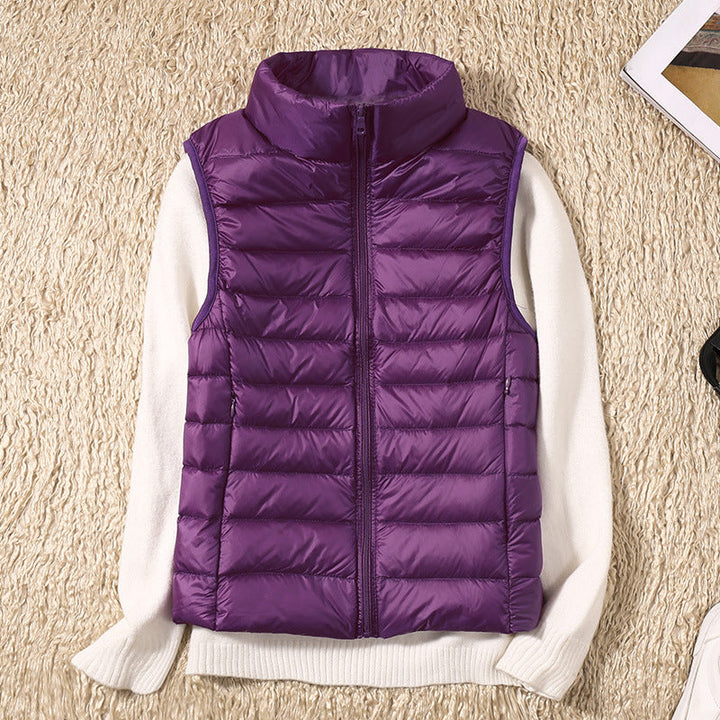 Amira™ | Chaleco ligero de plumas con diseño plisado
